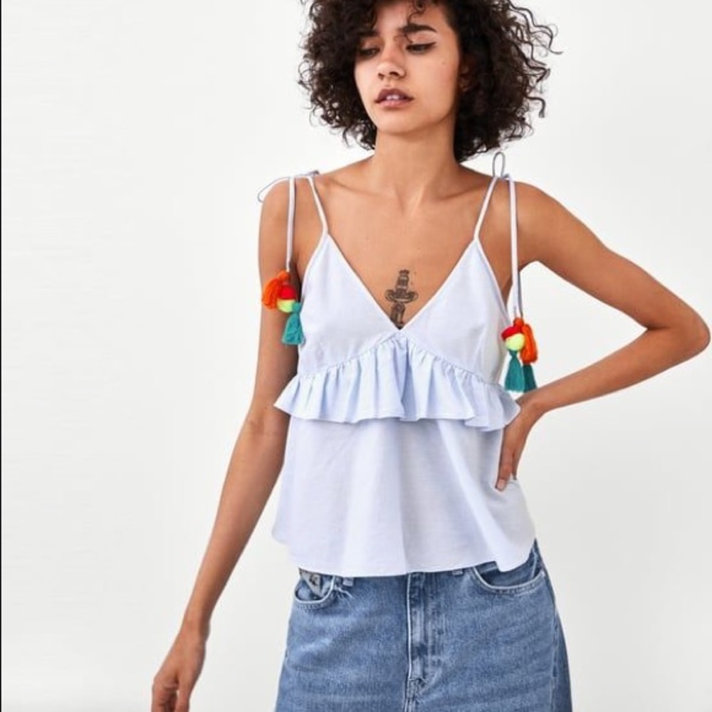 Zara Ruffle Tank with Pom Pom Tassels. Light blue. Size M